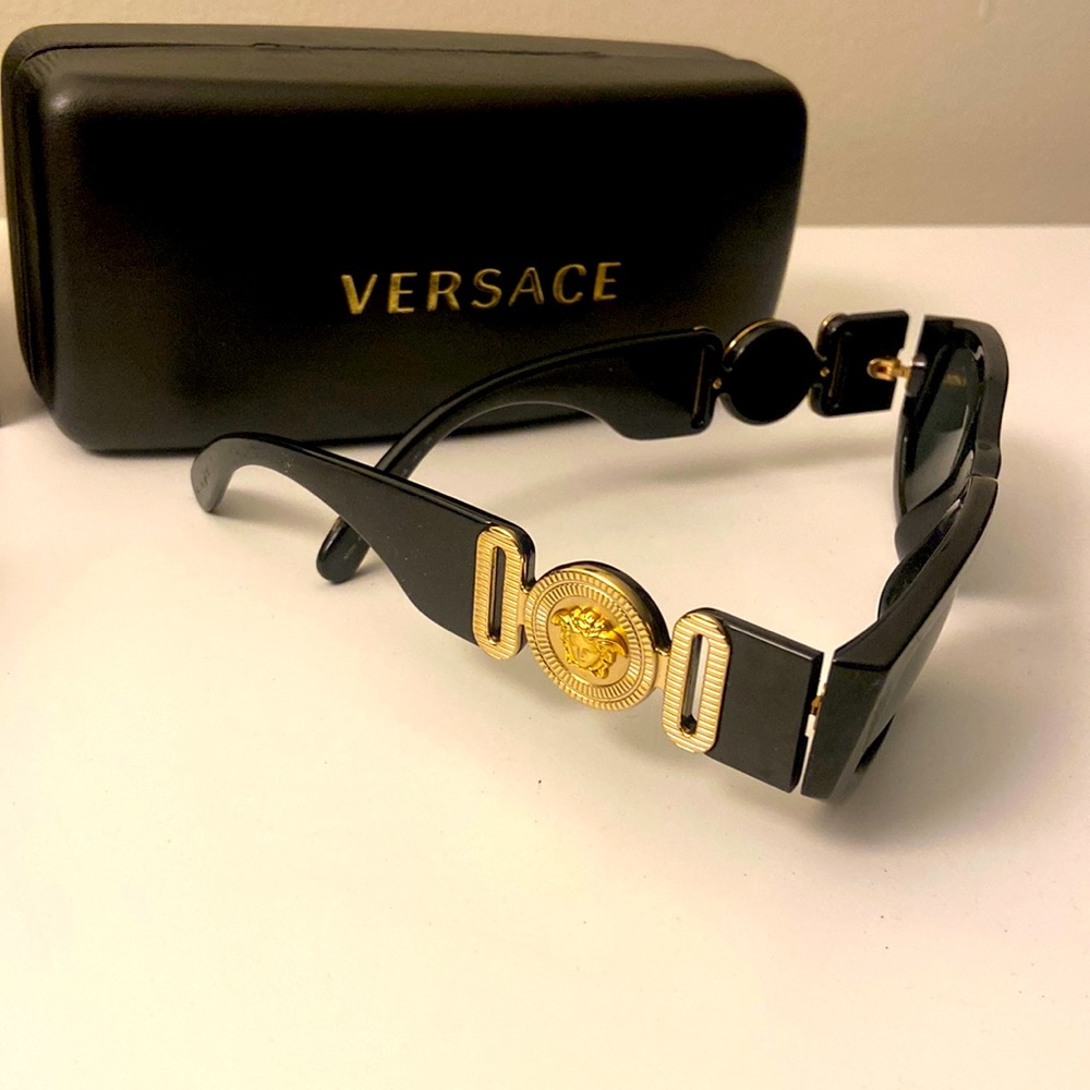 2 pairs of Versace sunglasses